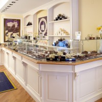 chocolate store with wainscot display case