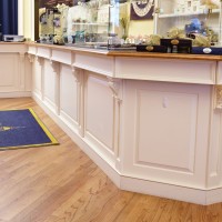 display case at retail store with wainscoting