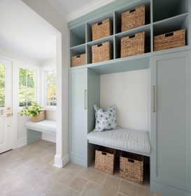sage green mudroom built-in cabinets