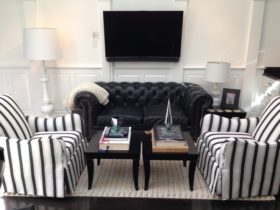 Raised Panel white Wainscoting in contemporary Living Room