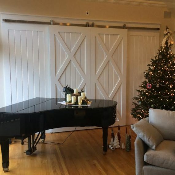 living room with sliding door during the christmastime